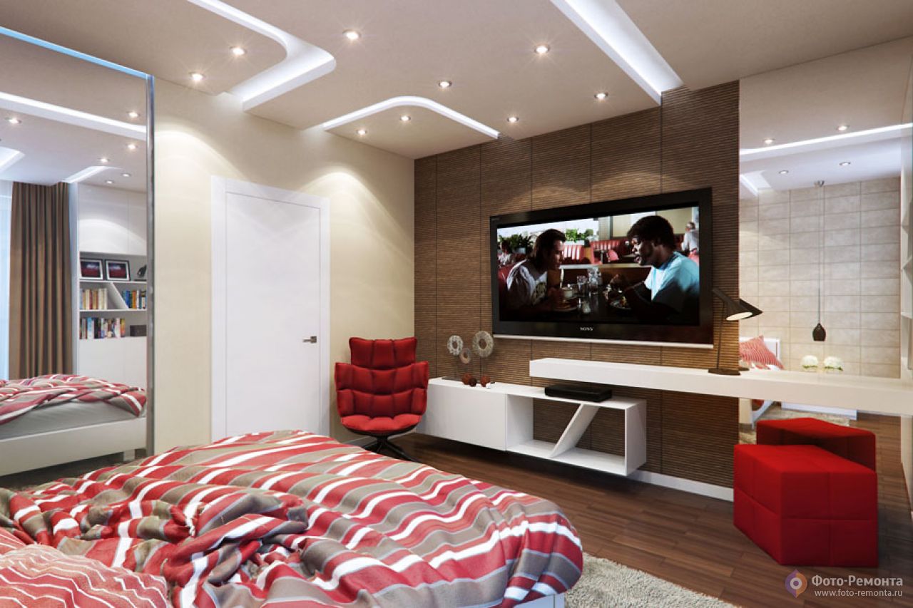 Телевизор в маленькой комнате. Спальня с большим телевизором. Стильная спальня с телевизором. Телевизор в спальне на стене. Спальня в современном стиле с телевизором.