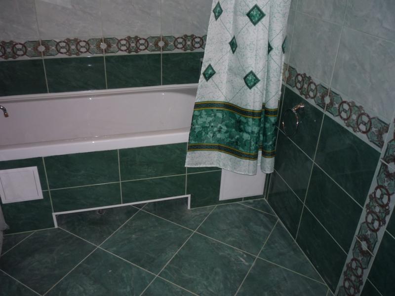 Фото ванны комнаты обложенная плиткой